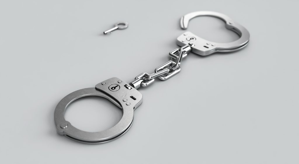 handcuffs criminal law arrest charges